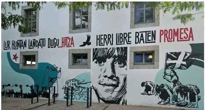 Iparretarrak (IK) erakunde armatuko kide izan zen Txomin Olhagarayren omenez Itsasu-n (Lapurdi) eginiko margo-irudia auzitegietara eraman du Simon Fetet Pirinio Atlantikoko Departamenduko prefeta berriak